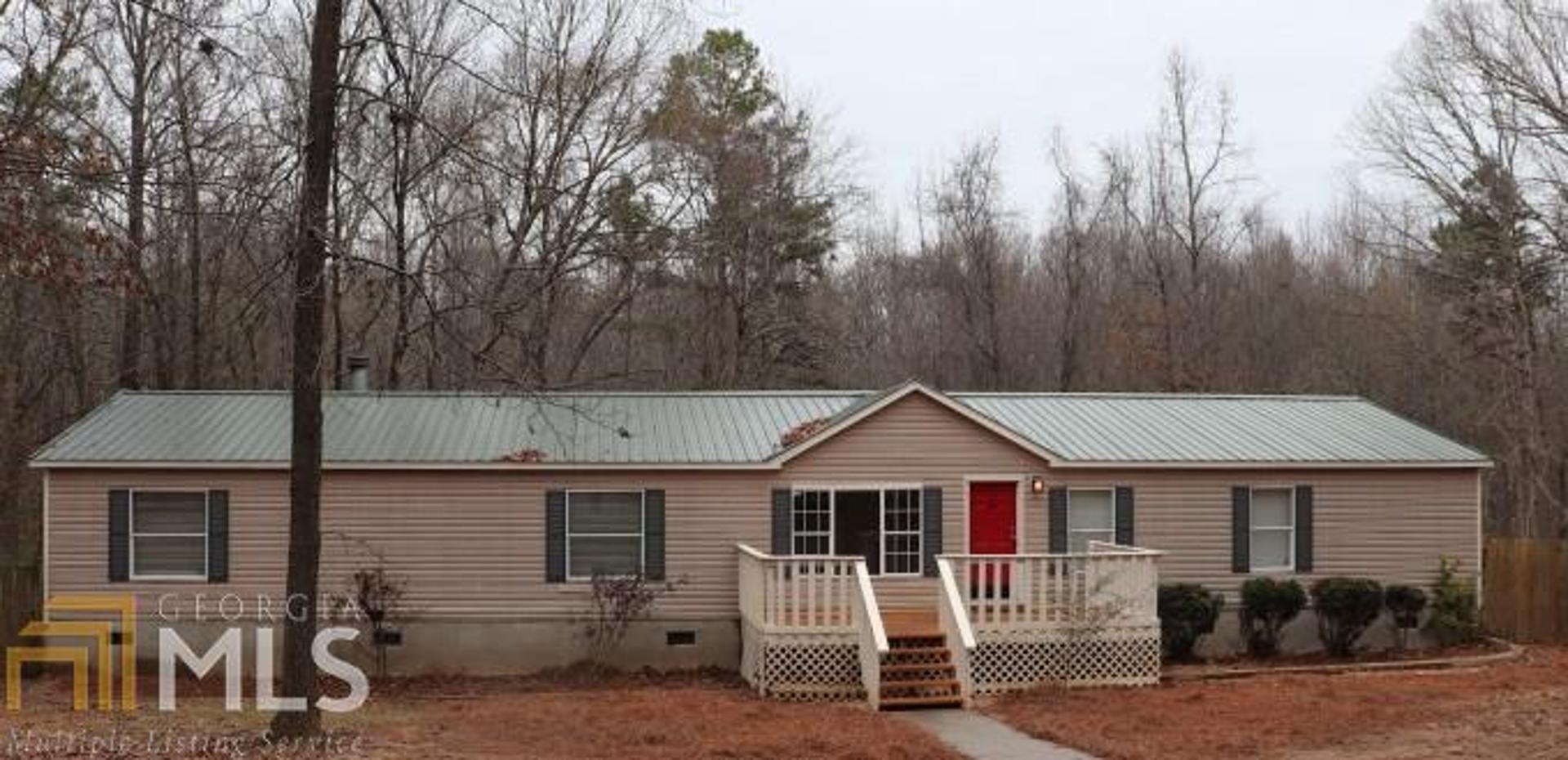 465 Elrod Road Jefferson, GA 30549 - Photo 1 of 1 a view of a house with a yard