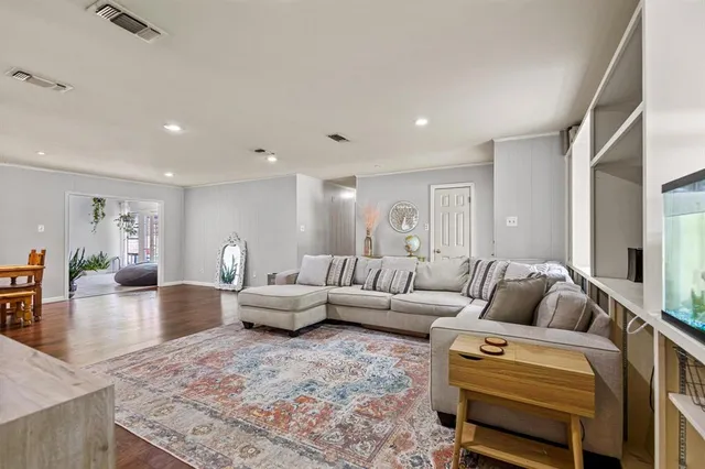 a living room with furniture and a couch