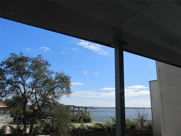 a kitchen with stainless steel appliances a refrigerator a sink and a stove