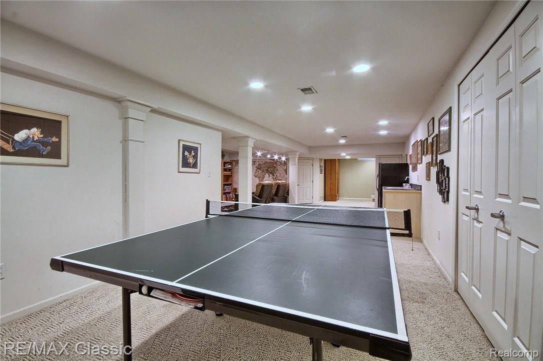 35610 Tall Pine Road Farmington, MI 48335 - Photo 24 of 32 Finished Basement with Snack/Wet Bar (on right)