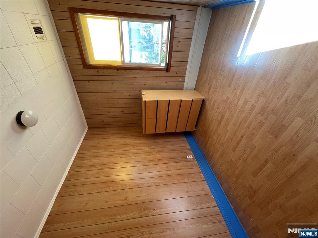 71 Passaic Street, Unit 2 Passaic, NJ 07055 - Photo 9 of 11 a view of an empty room with a window