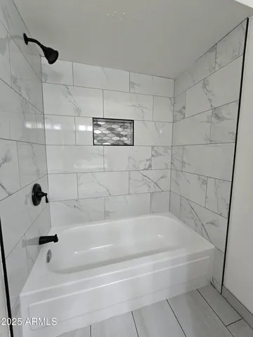 a bathroom with a bathtub