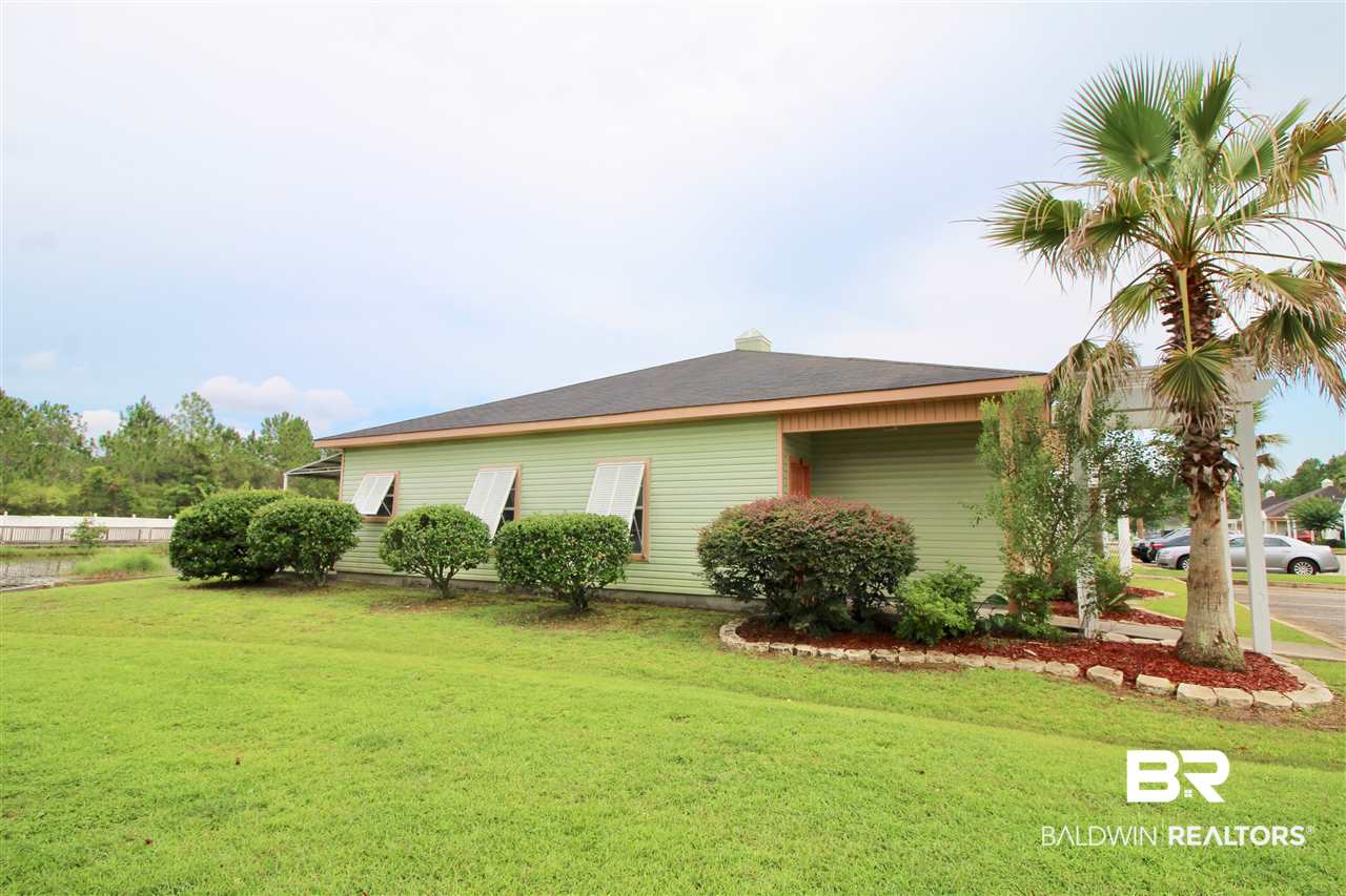 4374 Lindsey Lane, Unit 4374A Orange Beach, AL 36561 - Photo 4 of 20 Beautifully maintained landscaping throughout