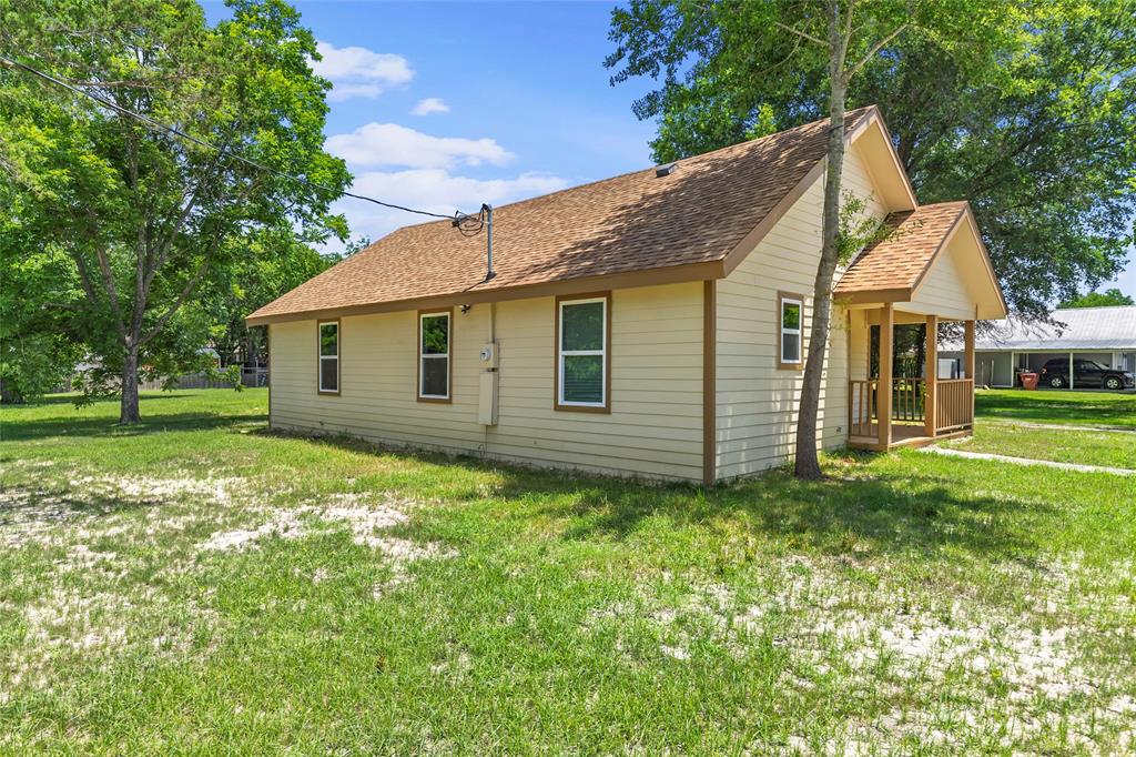 211 Southeast 7th Street Cooper, TX 75432 - Photo 26 of 29 a view of a house with backyard