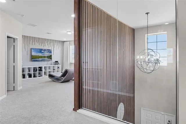 a bathroom with a sink a toilet a mirror and shower