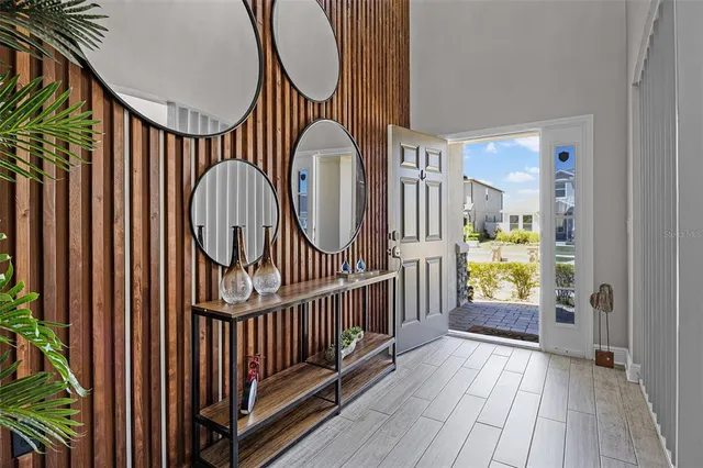 a view of entryway with wooden floor
