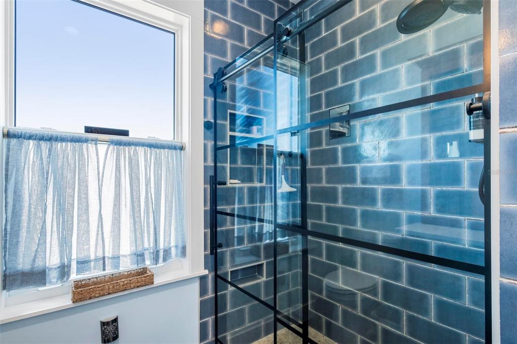 331 Land Street Eastpoint, FL 32328 - Photo 17 of 36 a bathroom with a shower
