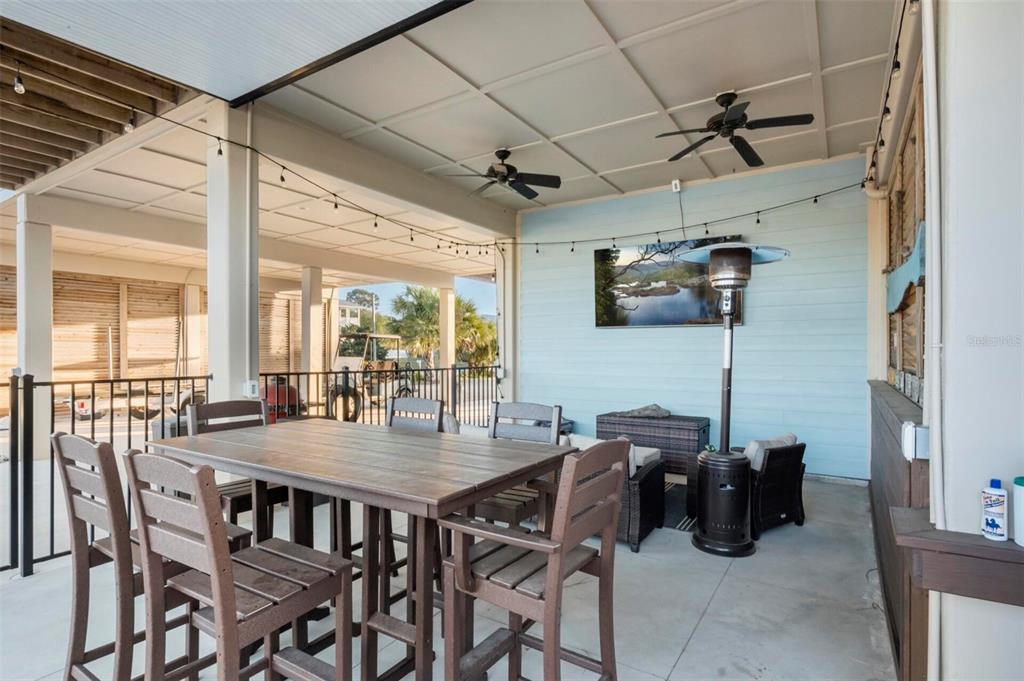 331 Land Street Eastpoint, FL 32328 - Photo 20 of 36 a view of a dining room with furniture window and outside view