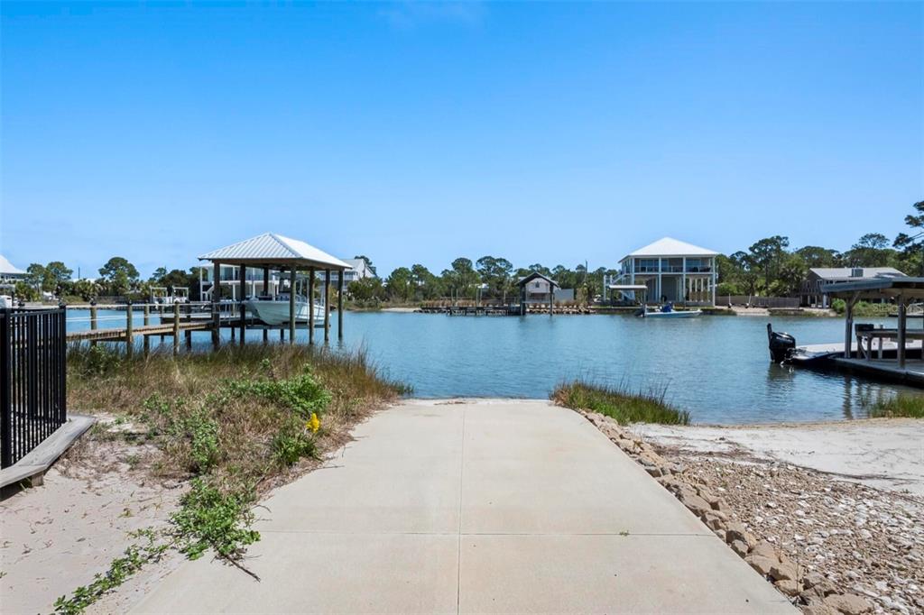 331 Land Street Eastpoint, FL 32328 - Photo 32 of 36 a view of a lake with a terrace