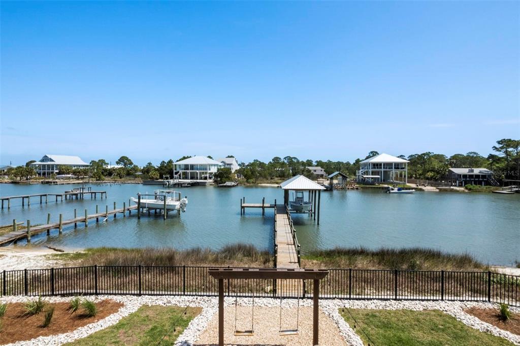 331 Land Street Eastpoint, FL 32328 - Photo 34 of 36 a city view from a lake