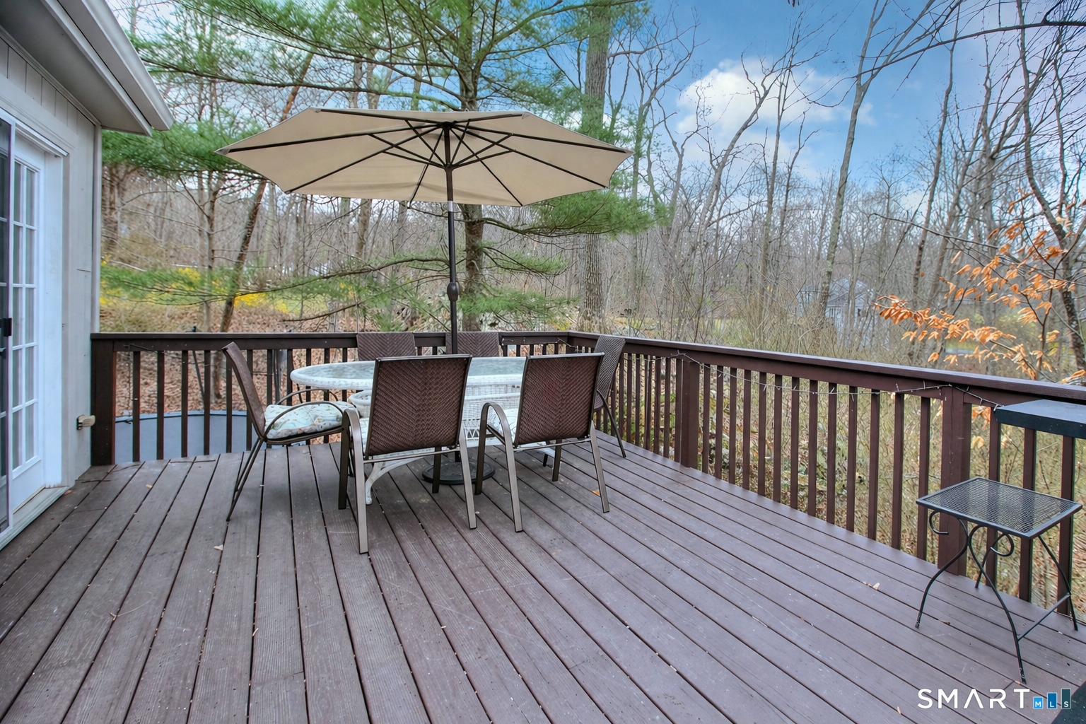 518 Bennetts Farm Road Ridgefield, CT 06877 - Photo 20 of 32 a view of balcony with furniture and umbrella