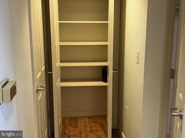 777 7th Street Northwest, Unit 930 Washington, DC 20001 - Photo 13 of 34 a view of walk in closet with empty racks