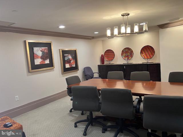 777 7th Street Northwest, Unit 930 Washington, DC 20001 - Photo 20 of 34 a view of a dining room with furniture and wooden floor