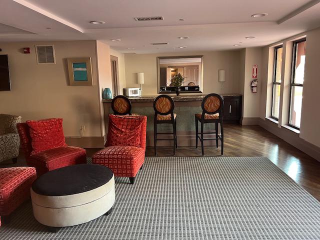 777 7th Street Northwest, Unit 930 Washington, DC 20001 - Photo 21 of 34 a living room with furniture a couch and large window