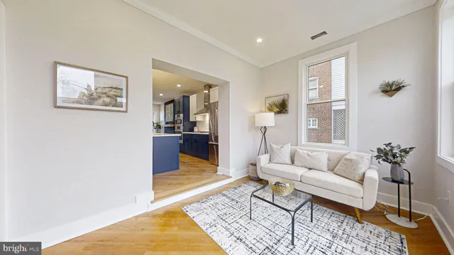 a bedroom with a bed and a chair