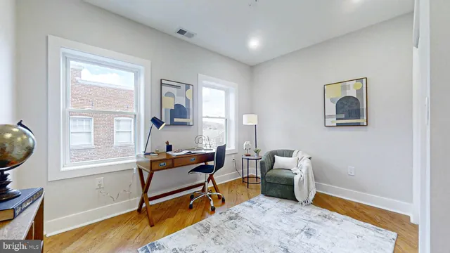 a bathroom with a tub sink and shower