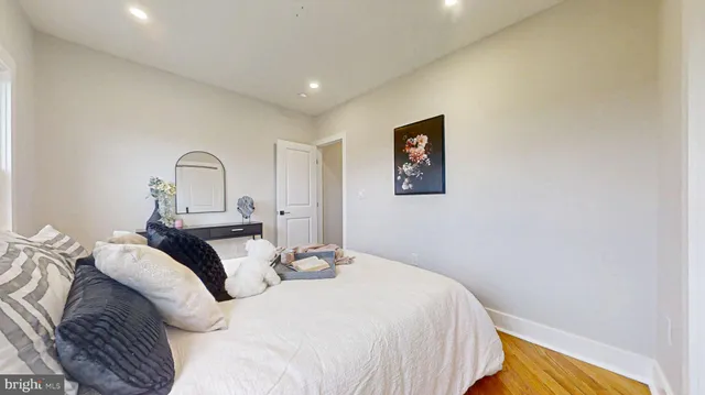 a living room with furniture fireplace and a flat screen tv