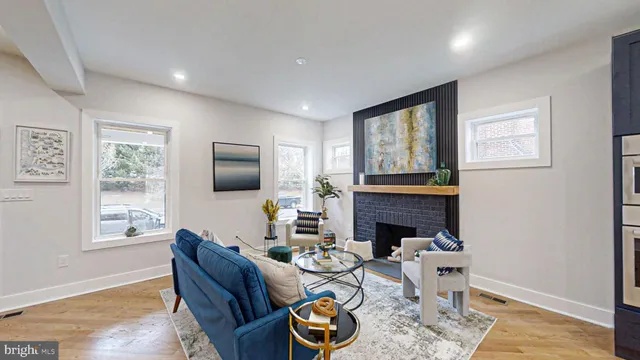a bedroom with bed and wooden floor