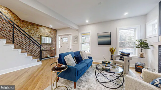 a room with a bed and a chair