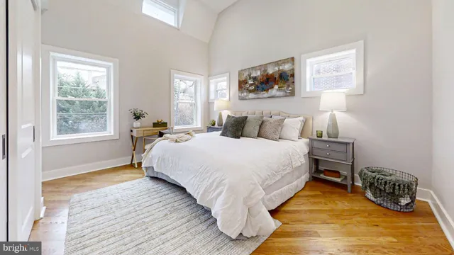 a front view of a residential apartment building with a yard