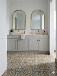 a bathroom with mirror a sink and a mirror