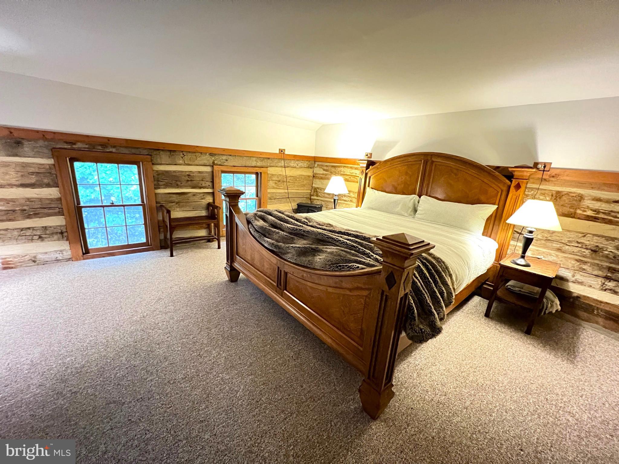259 Riley Hollow Road Huntly, VA 22640 - Photo 14 of 33 a bedroom with a bed and a couch
