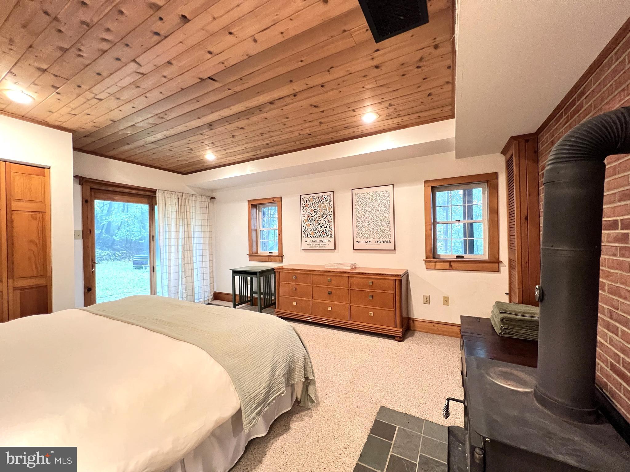 259 Riley Hollow Road Huntly, VA 22640 - Photo 17 of 33 a spacious bedroom with a large bed and a dresser