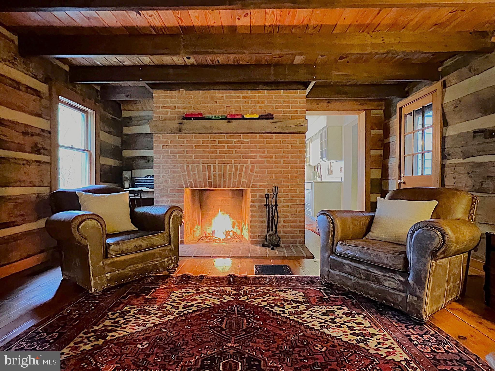 259 Riley Hollow Road Huntly, VA 22640 - Photo 3 of 33 a living room with furniture and a fireplace