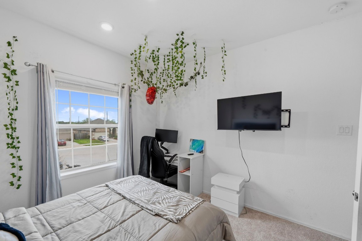 5142 Dunstable Manor Lane Rosharon, TX 77583 - Photo 23 of 30 Additional bedrooms that provide flexibility for guests, family, or a home office.