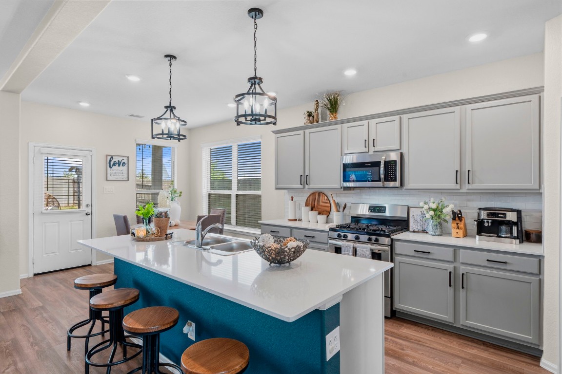 5142 Dunstable Manor Lane Rosharon, TX 77583 - Photo 10 of 30 Functional kitchen with ample cabinetry and workspace