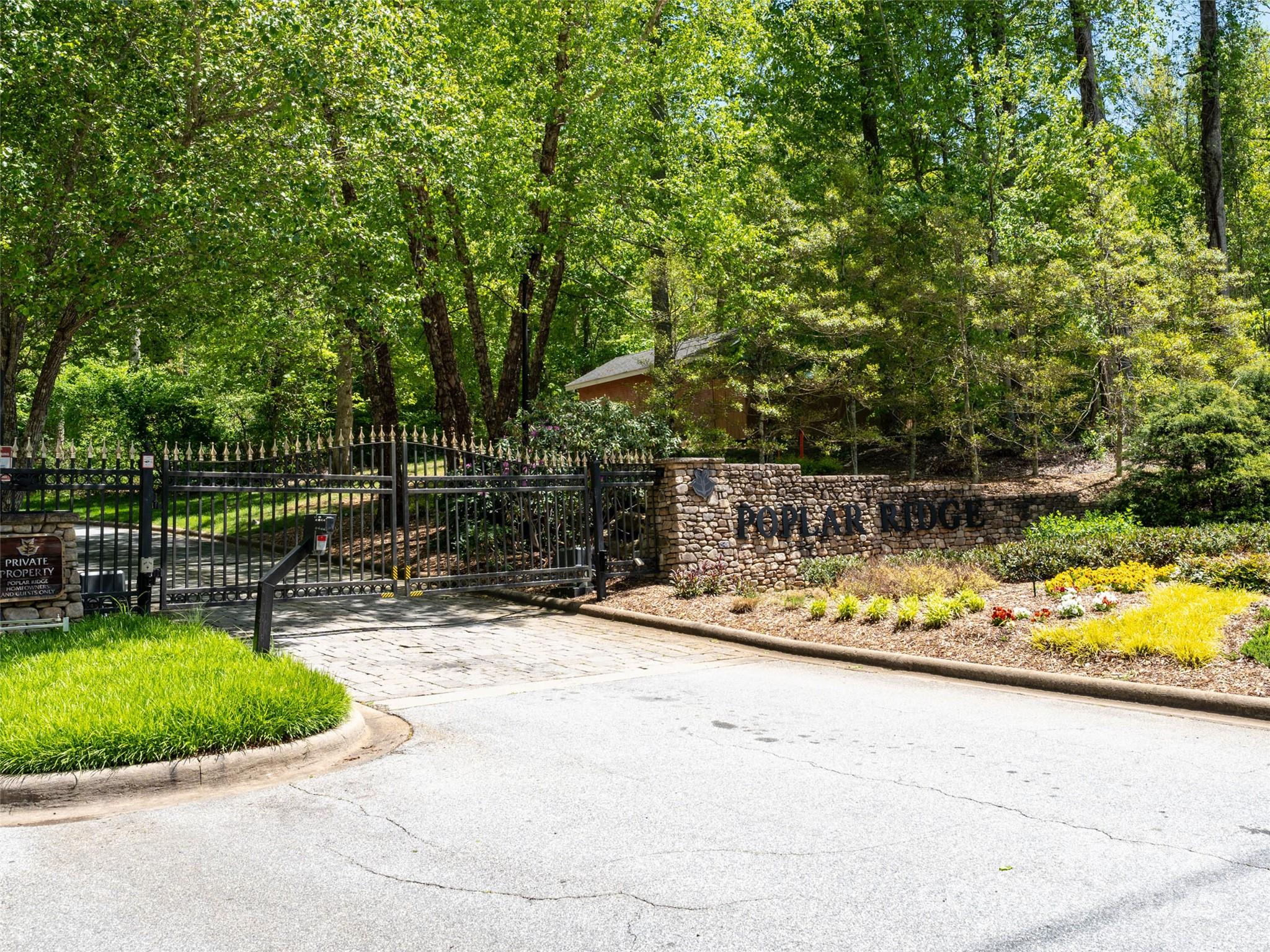 26 Fall Mountain Road, Unit 58 Asheville, NC 28803 - Photo 23 of 25 a view of a backyard with wooden fence