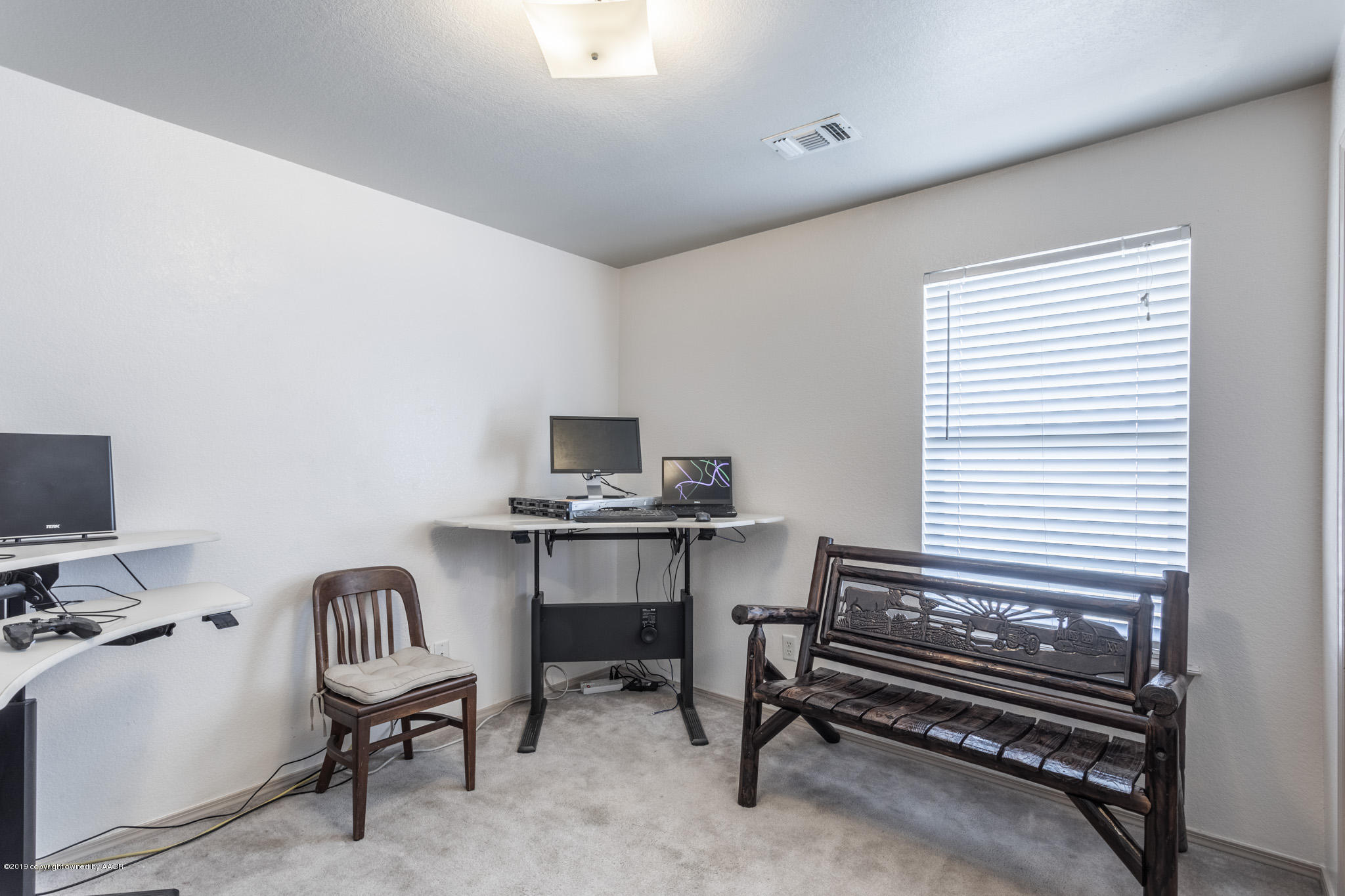 1111 Pikes Peak Drive Amarillo, TX 79110 - Photo 10 of 15 a view of a workspace with furniture