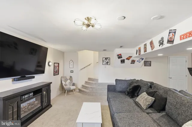 a living room with furniture and a couch