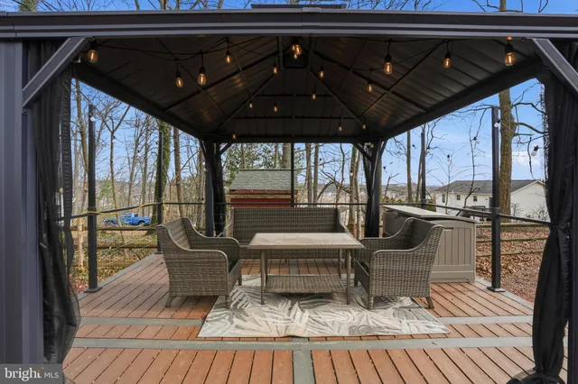 a front view of a building with trees