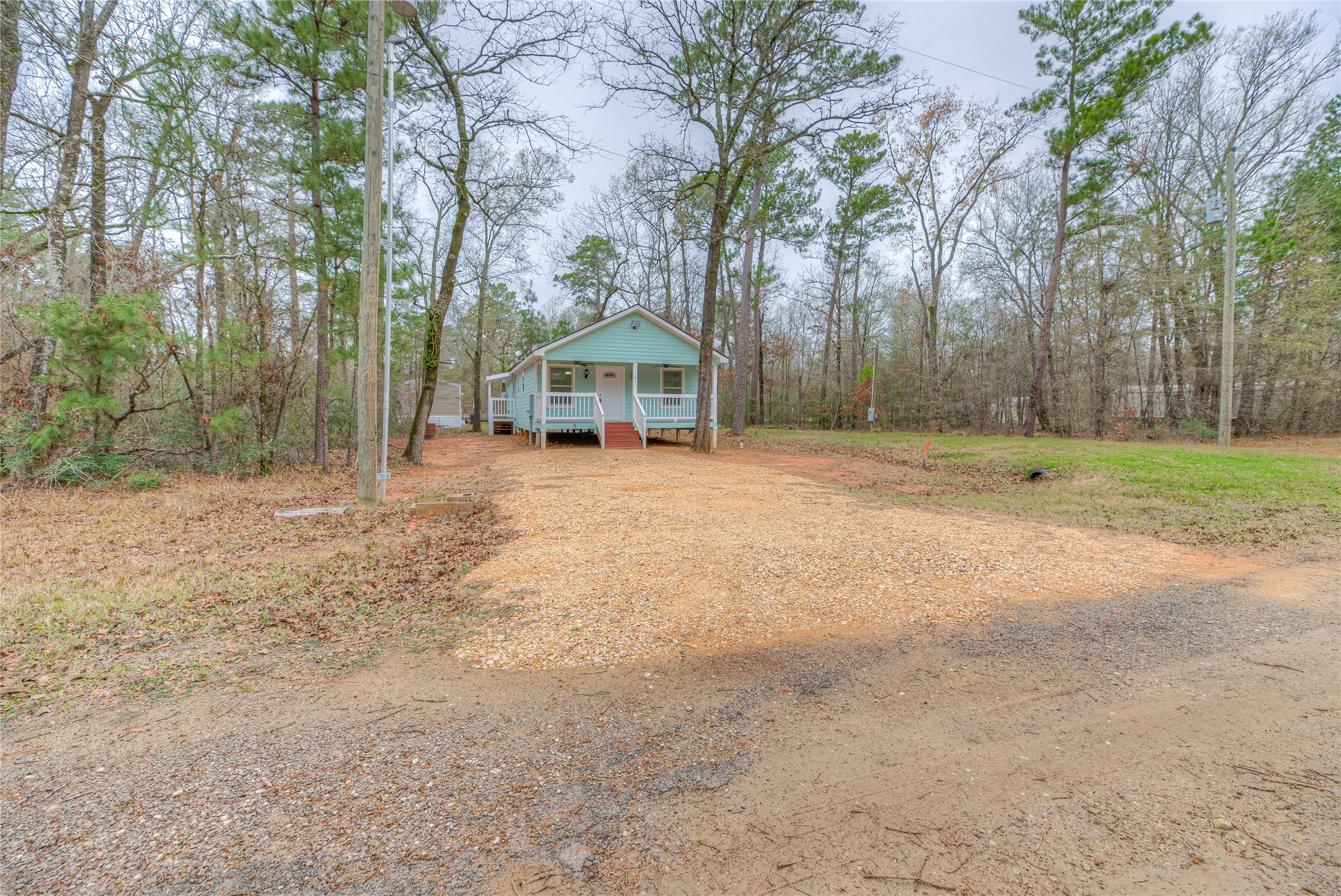 161 Evergreen Livingston, TX 77351 - Photo 24 of 35 Located on one lot, no neighbors on either side.