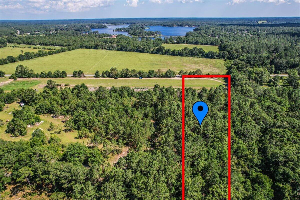 0 King Lake Road, Unit PARCEL D DeFuniak Springs, FL 32433 - Photo 2 of 9 an aerial view of swimming pool and mountain view