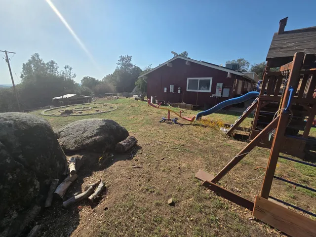 a view of a house with a park