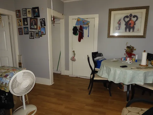 a bedroom with a bed and a cabinets