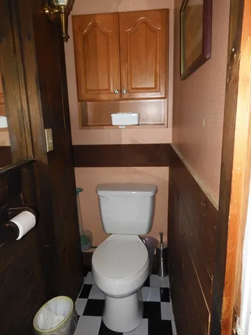 a bathroom with a toilet