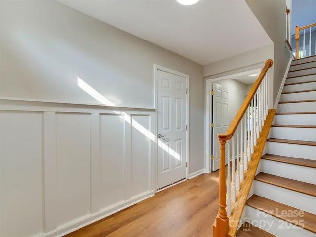 a view of entryway with wooden floor