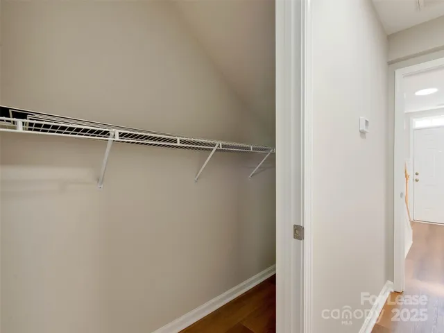 a view of a room with racks on the wall