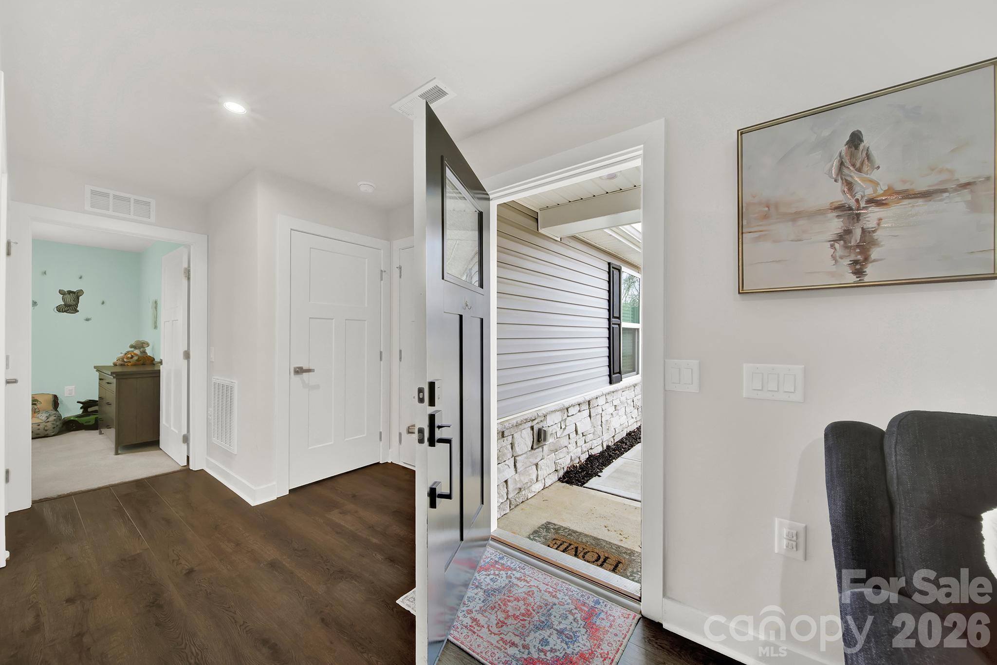 515 Grandiflora Avenue Lancaster, SC 29720 - Photo 5 of 29 a view of a hallway with interior of the house
