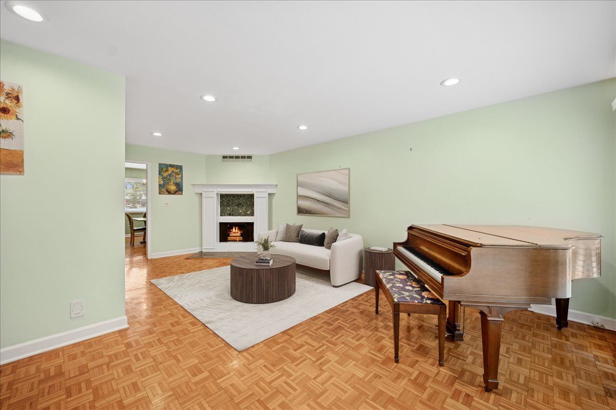 1918 Wilmette Avenue, Unit B Wilmette, IL 60091 - Photo 2 of 26 a living room with furniture a flat screen tv and a fireplace