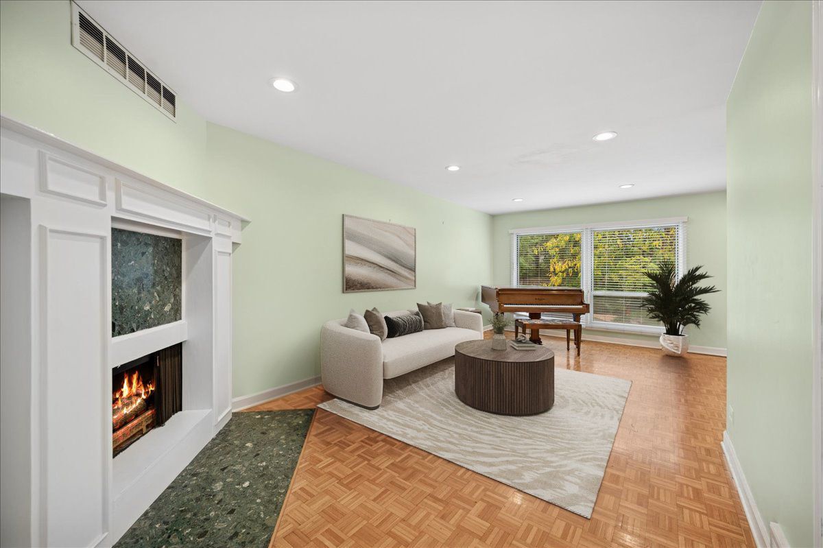 1918 Wilmette Avenue, Unit B Wilmette, IL 60091 - Photo 3 of 26 a living room with furniture and a fireplace