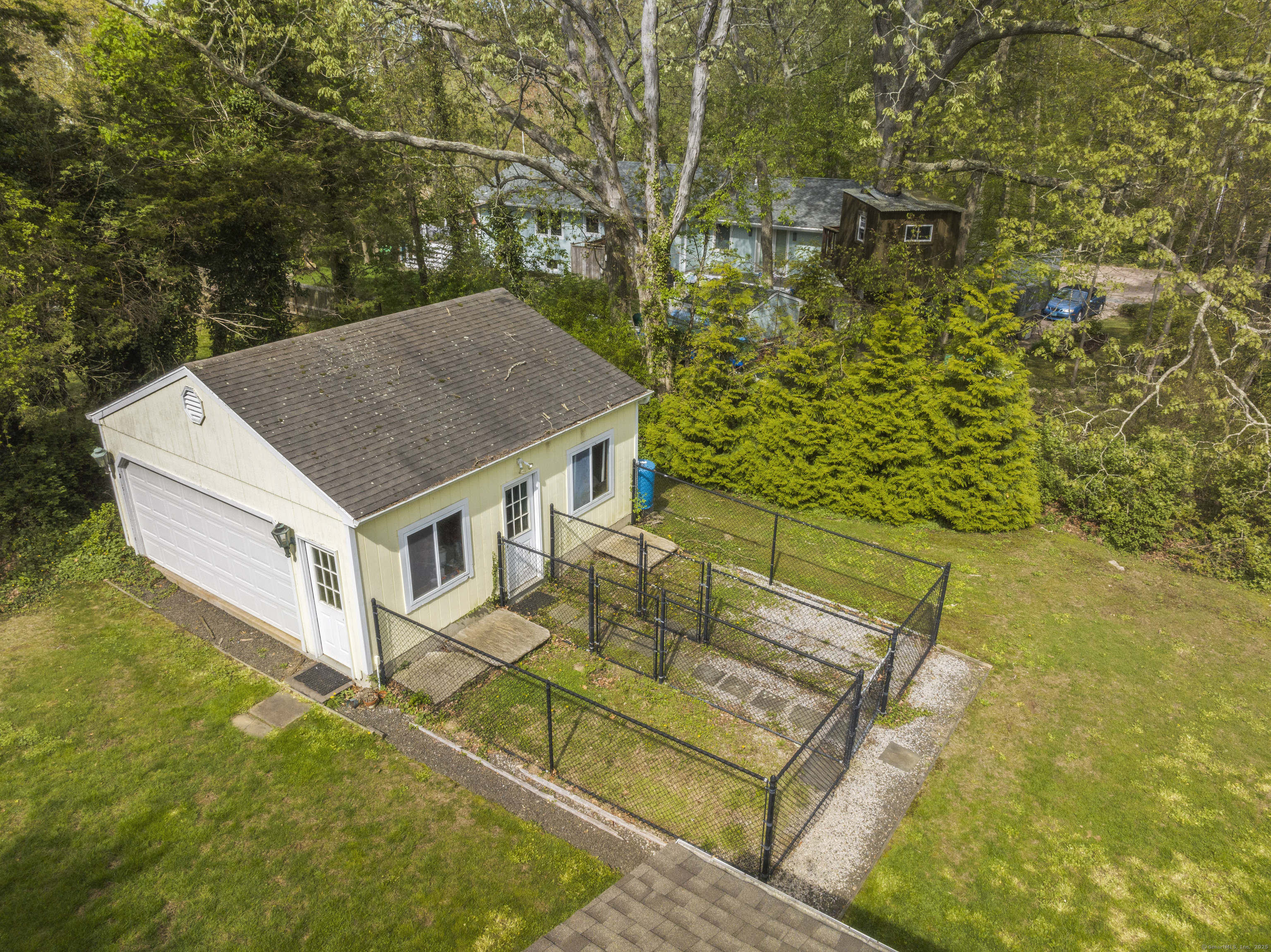 55 Harbor View Road Guilford, CT 06437 - Photo 24 of 38 a view of a house with a yard
