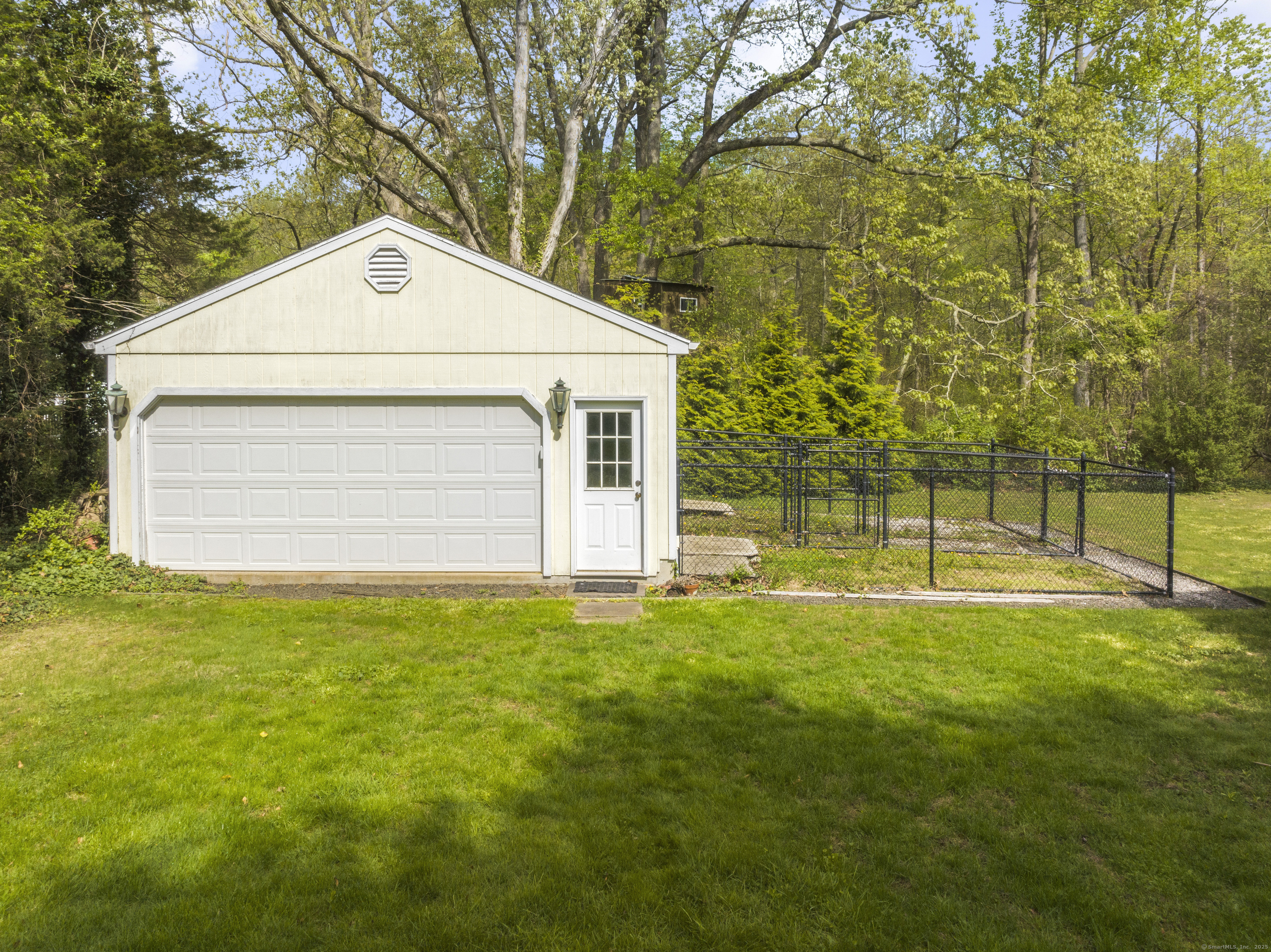 55 Harbor View Road Guilford, CT 06437 - Photo 27 of 38 a view of a house with a yard