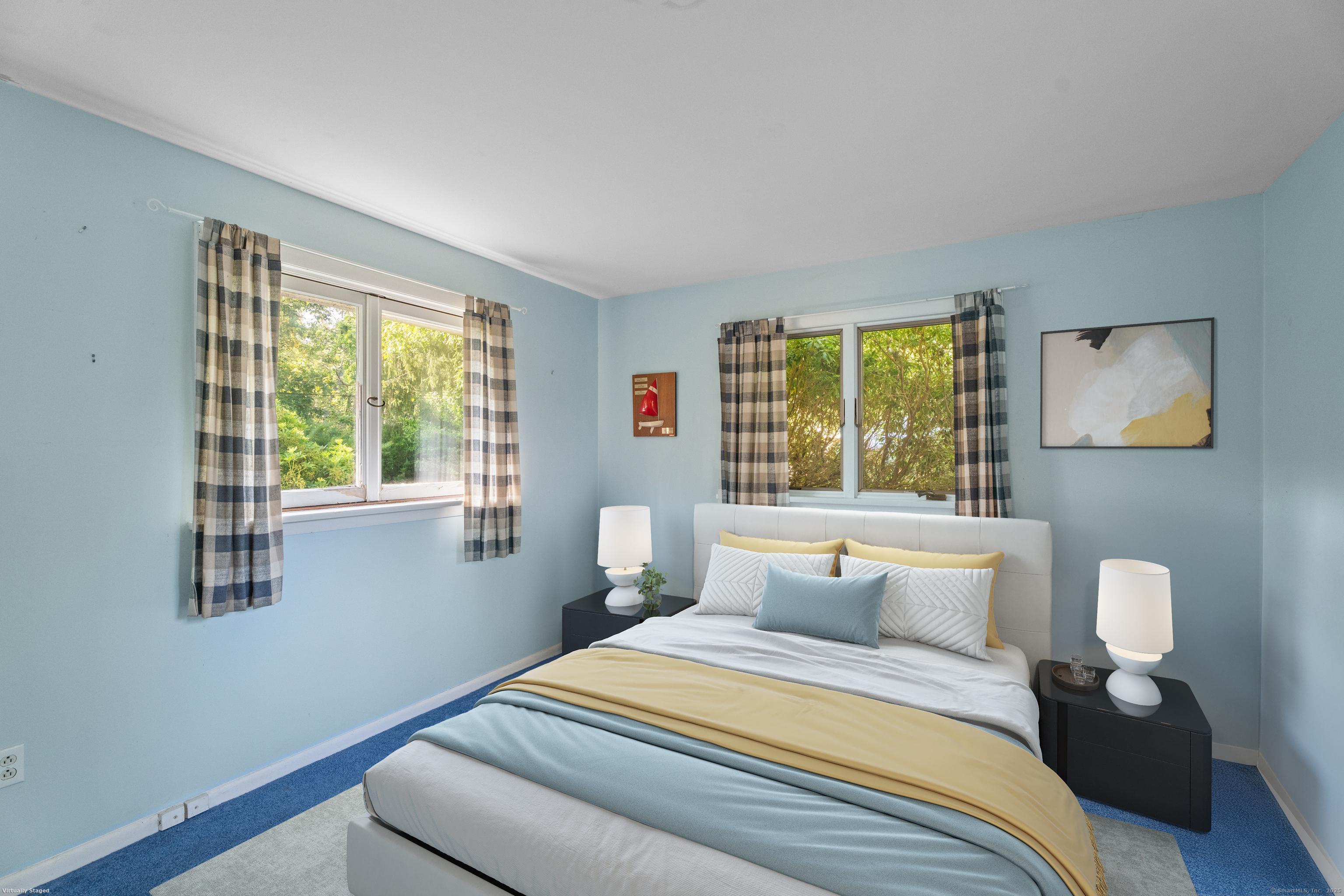 55 Harbor View Road Guilford, CT 06437 - Photo 10 of 38 a bedroom with a bed and a window