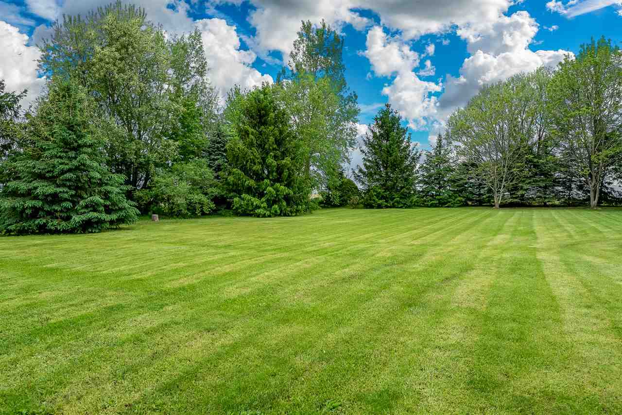 15666 East Bethel Road Rochelle, IL 61068 - Photo 11 of 22 a view of a garden