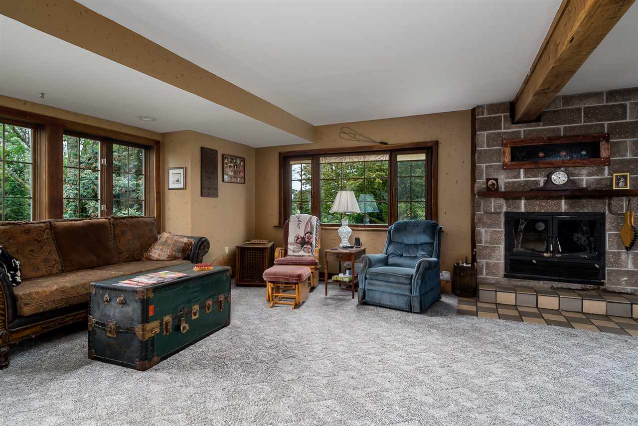 15666 East Bethel Road Rochelle, IL 61068 - Photo 14 of 22 a living room with furniture and a fireplace
