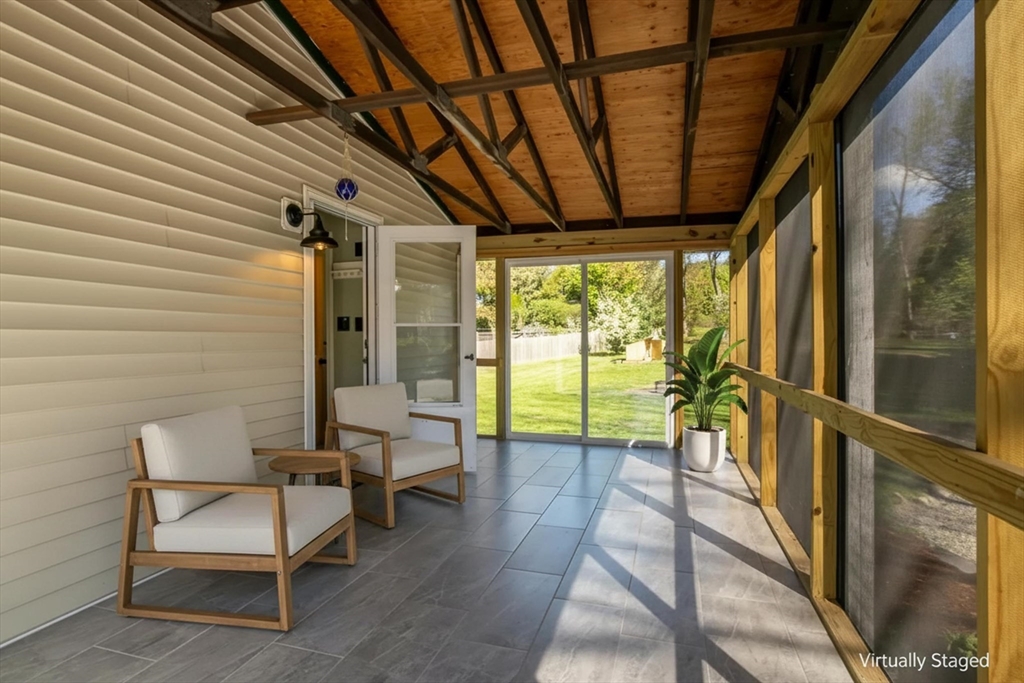 196 Center Street Groveland, MA 01834 - Photo 14 of 32 a porch with wooden floor